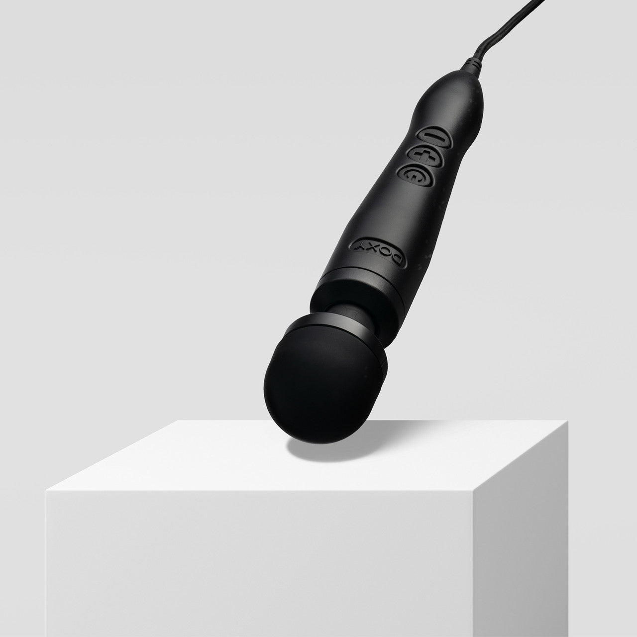 Close view of the Doxy 3 USB-C Matte Black wand showing the power, plus and minus controls