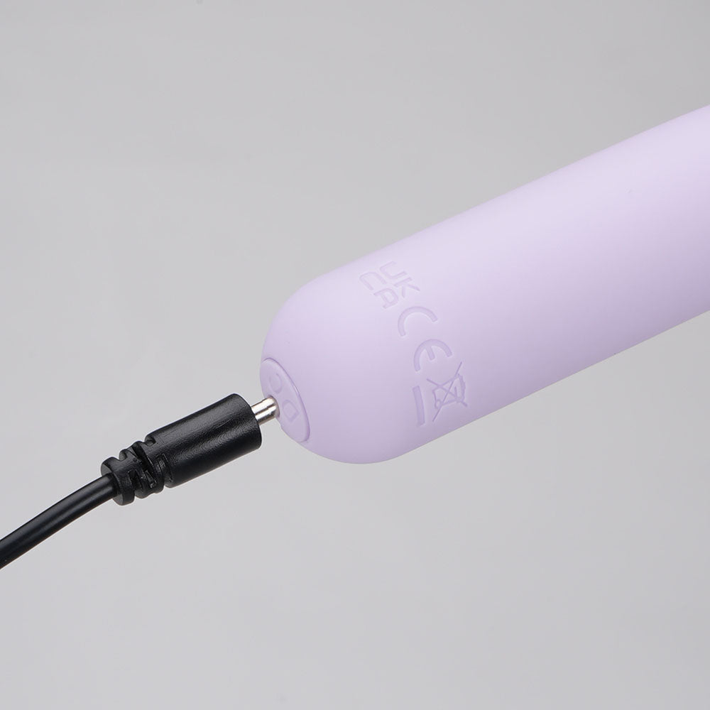 USB charging pin being inserted into the Maia Tawni silicone charging port