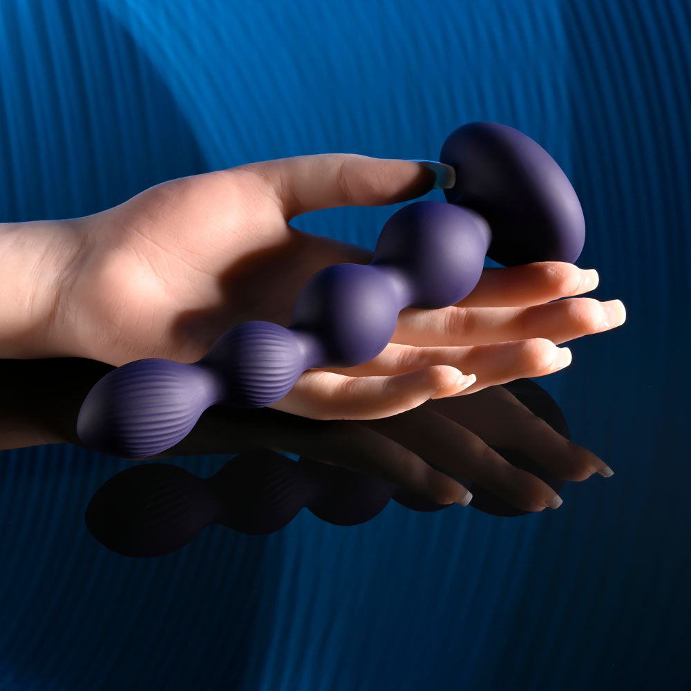 Evolved PLEASURE ORBIT - Navy Blue 17.8 cm USB Rechargeable Twirling & Vibrating Anal Beads with Remote Evolved